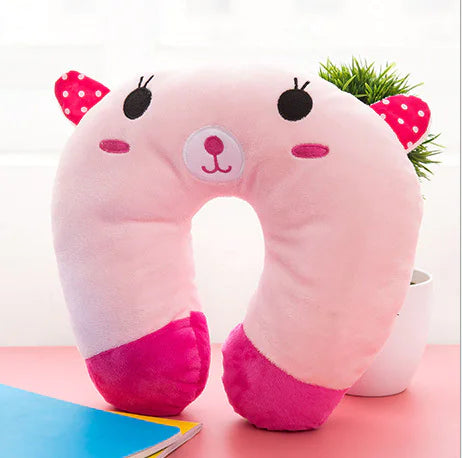 Pink and purple cartoon neck pillow on a white background