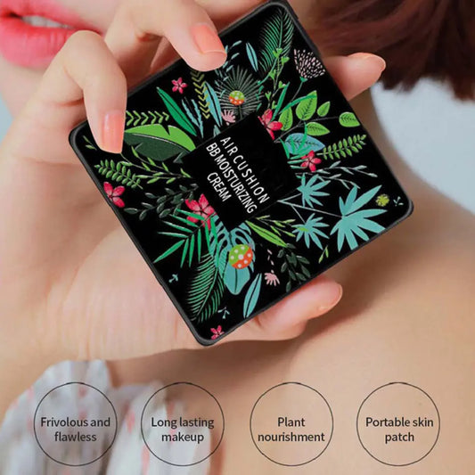 Hand holding a cosmetic case with floral design and text about product features.